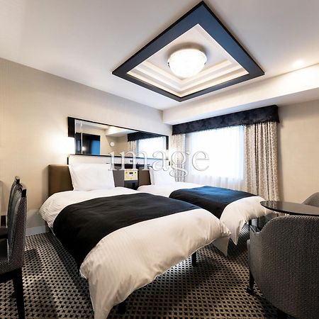 Apa Hotel Niigata Tsubamesanjo Ekimae Bagian luar foto